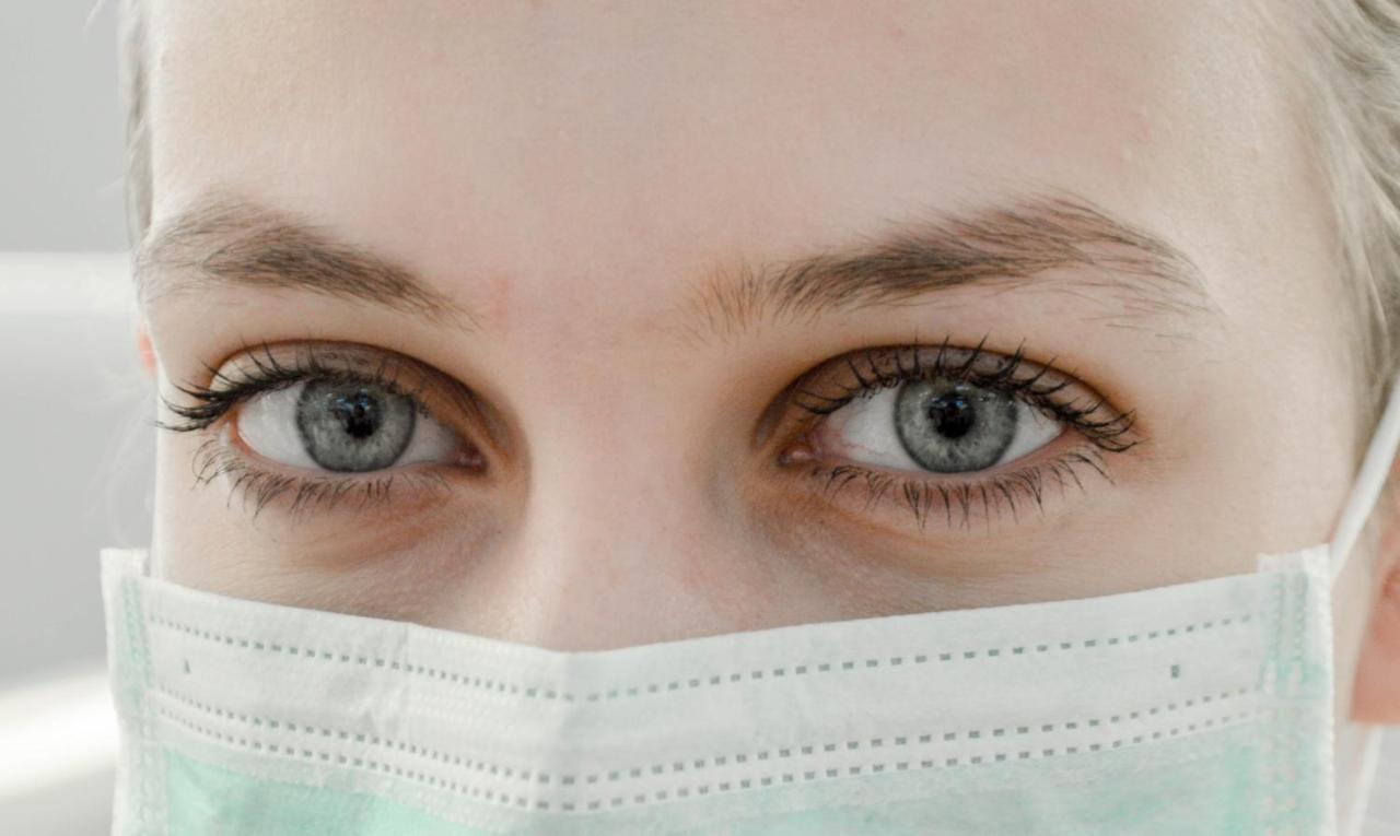 Novotel Chennai Sipcot Exterior photo A doctor wearing a surgical mask