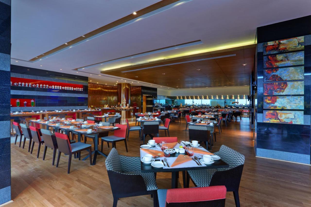 Novotel Chennai Sipcot Exterior photo The interior of the restaurant