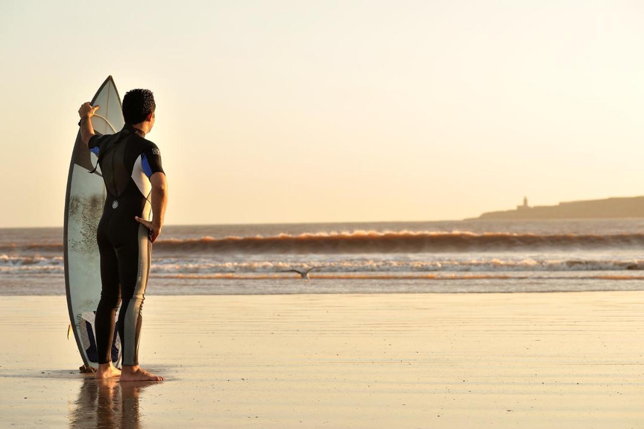 Novotel Chennai Sipcot Exterior photo Surfer at the beach