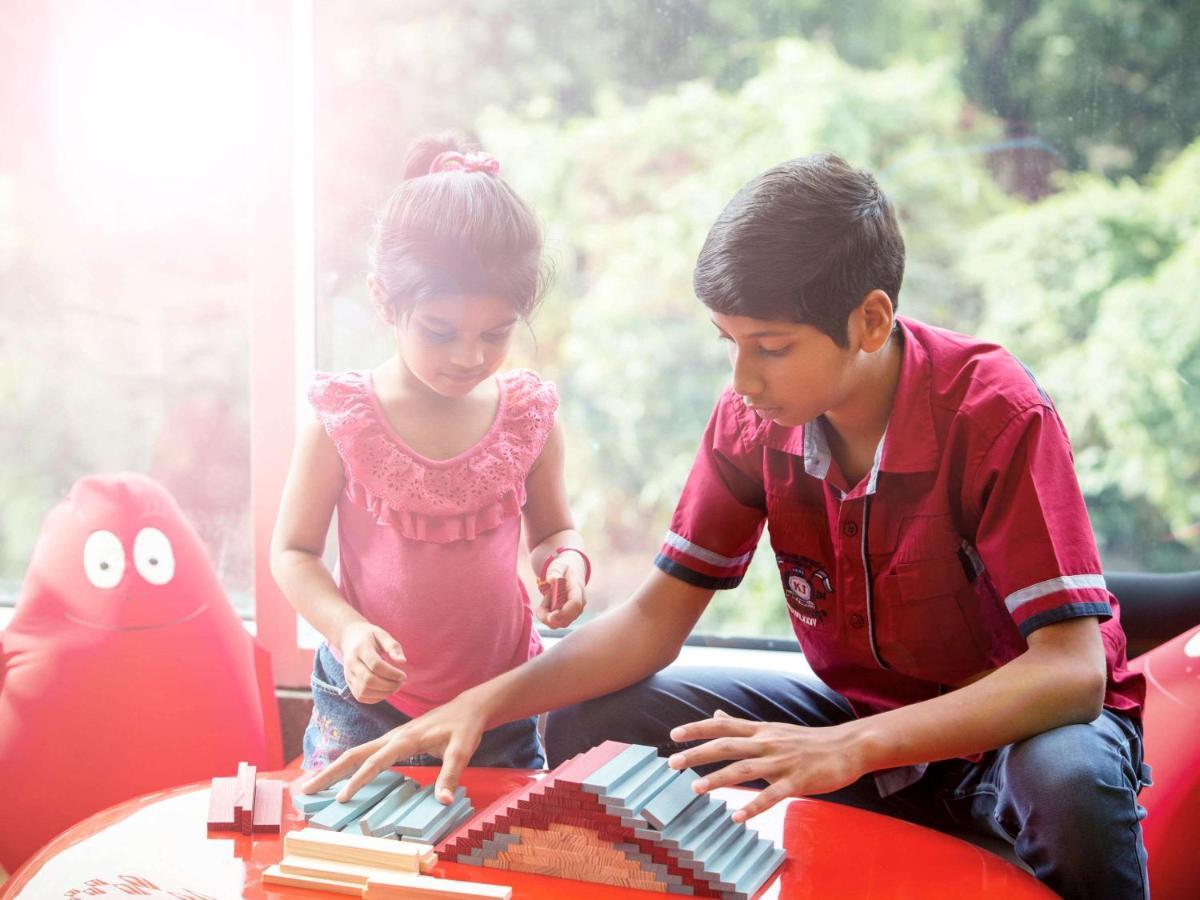 Novotel Chennai Sipcot Exterior photo Children playing with the piano